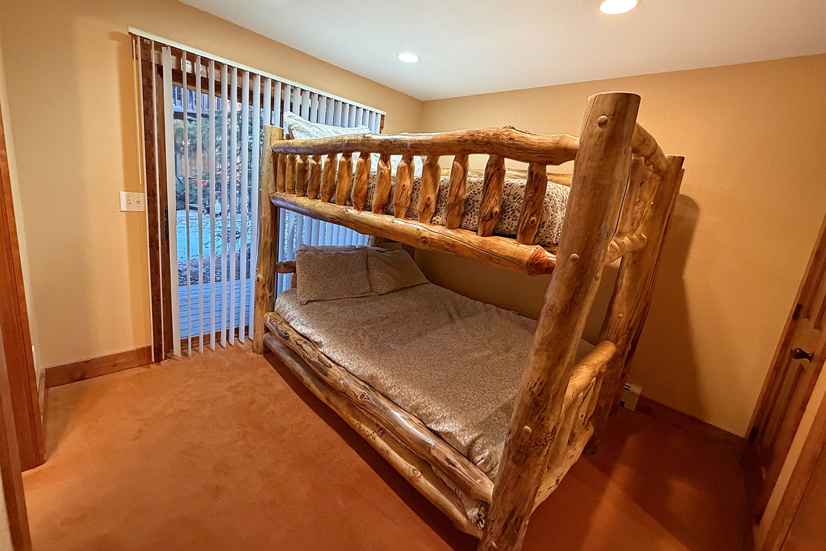 Bedroom #3 with Queen-over-Queen bunk beds and attached bathroom.