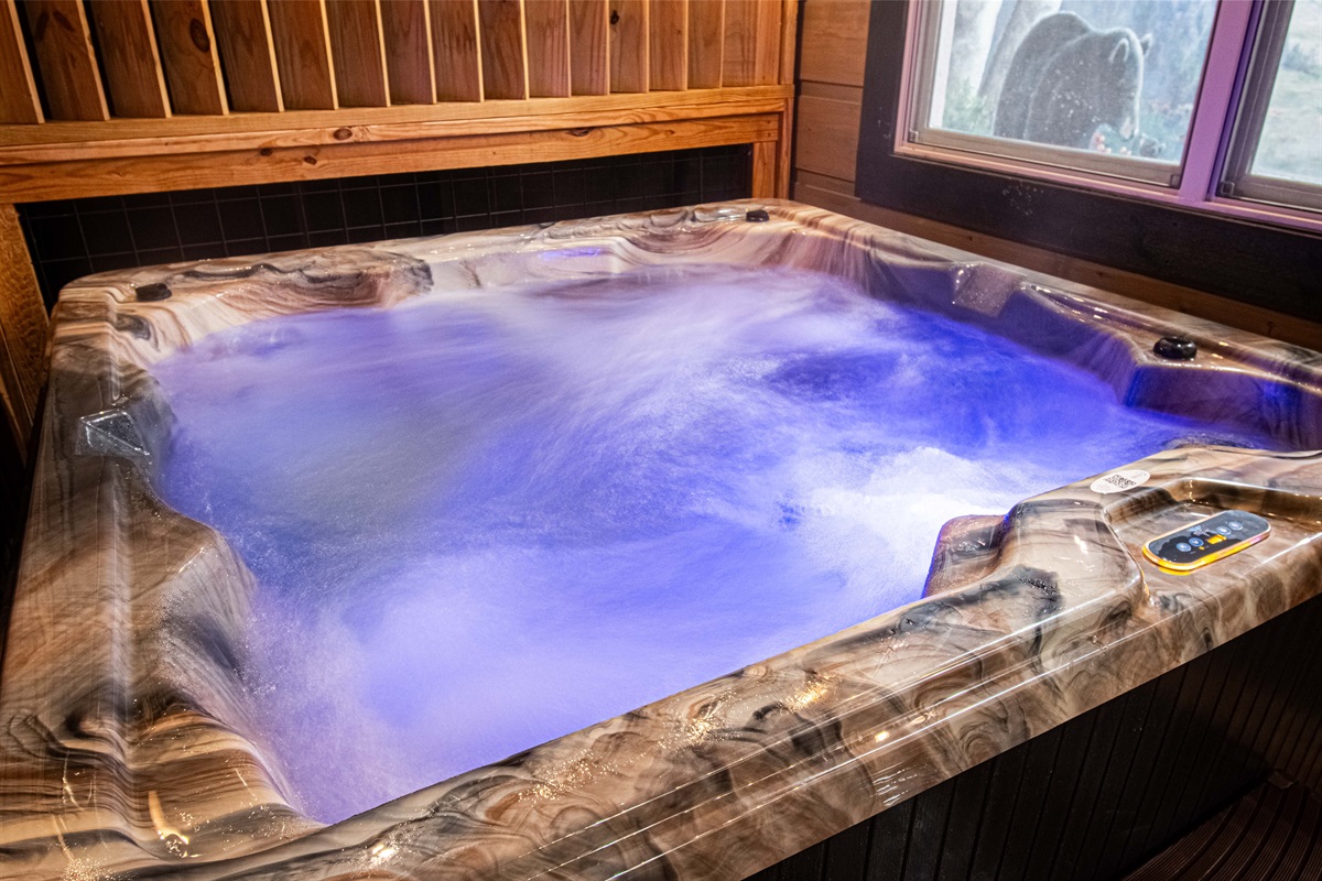 6 seater hot tub is on the lower deck.