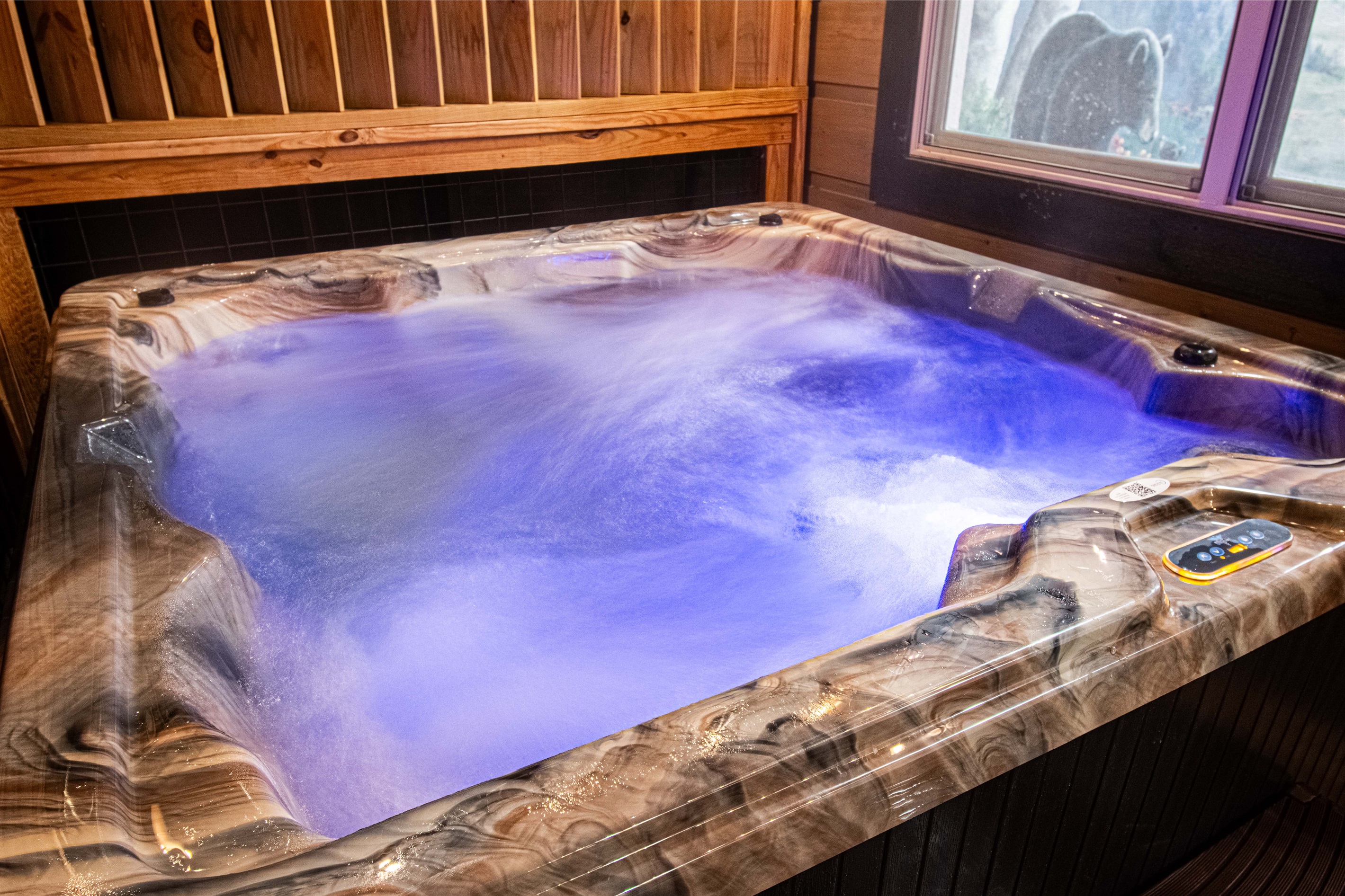 6 seater hot tub is on the lower deck.