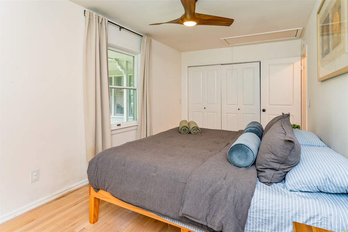 Relax in this main floor king bedroom and plush bedding—your perfect escape after a day of Finger Lakes adventure