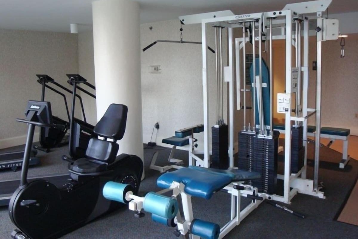 Exercise facility located directly next to indoor pool area