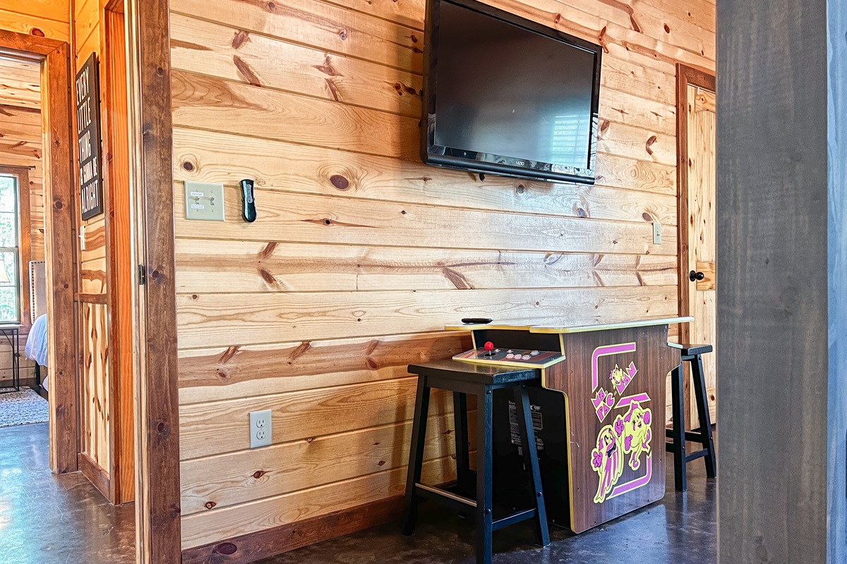 Bunk room complete with smart TV and Ms. Pac Man