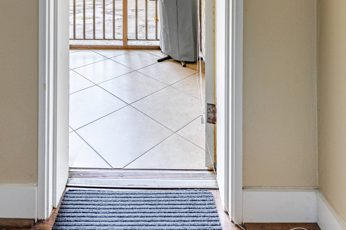 Direct balcony access opens to a private outdoor space, perfect for relaxing and enjoying the fresh air.