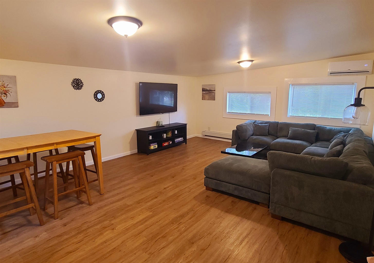 NEW LISTINGS - Large sectional in living room with SmartTV