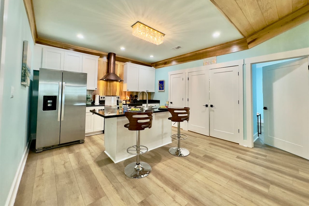 We invite you to enjoy this clean, stylish cooking space.