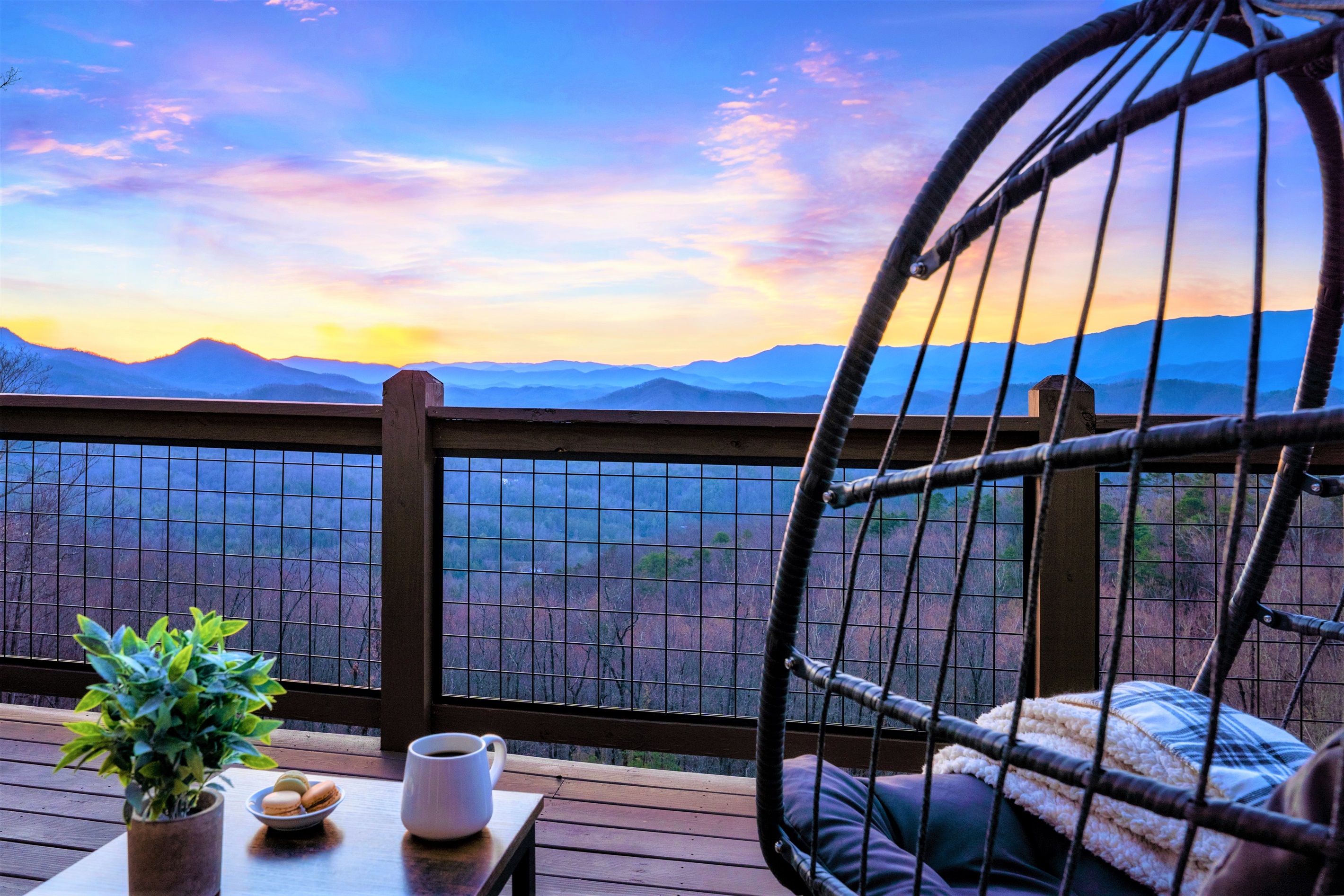Nestled in the egg chair with your favorite drink while taking in the sweeping AMAZING mountain views with that crisp mountain air that goes for miles on end as you unwind on the upper master bedroom’s private deck. 