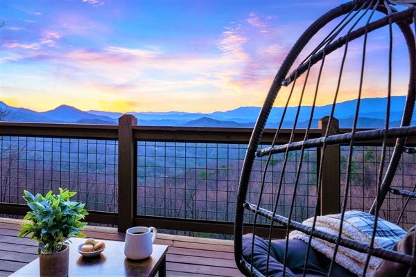 Nestled in the egg chair with your favorite drink while taking in the sweeping GORGEOUS mountain views with that crisp mountain air that goes for miles on end as you unwind on the upper master bedroom’s private deck. 