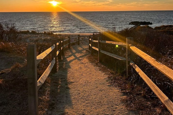 Follow this golden, sun-drenched path directly to the water's edge. This scenic walkway through the dunes offers front-row seats to spectacular bay sunsets, making every evening of your vacation feel truly magical.