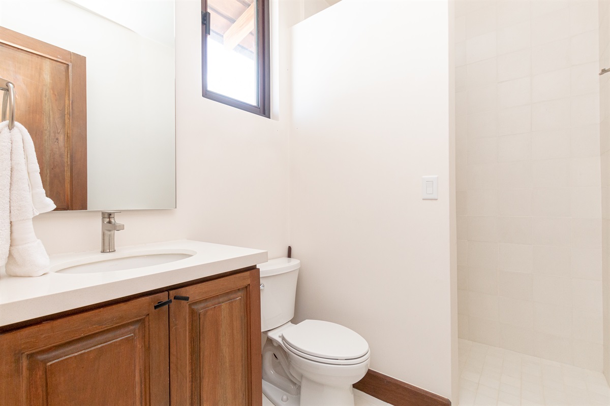 Secondary bedroom ensuite bathroom with shower.
