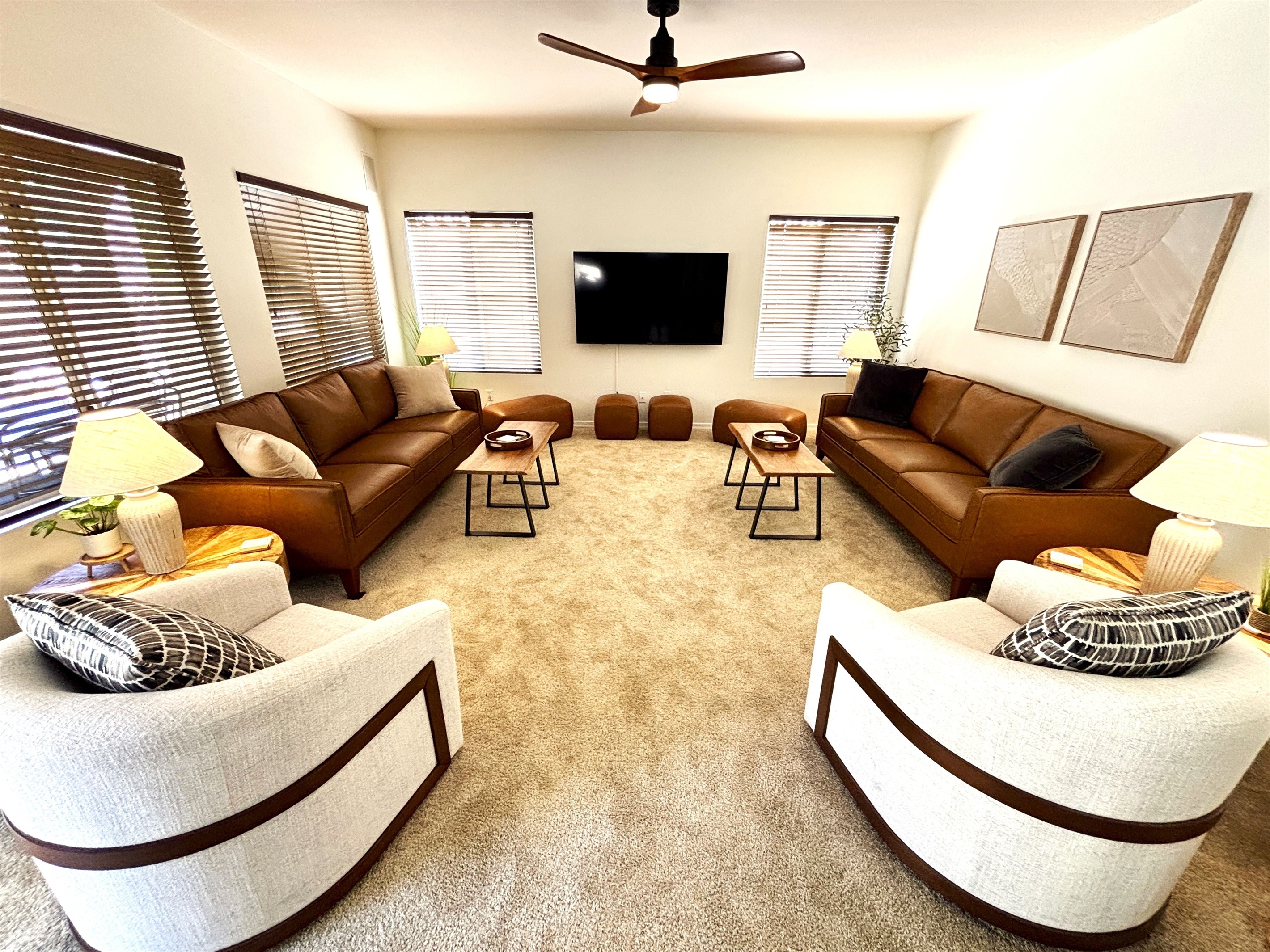 Open concept family room with 65" smart TV and plenty of seating