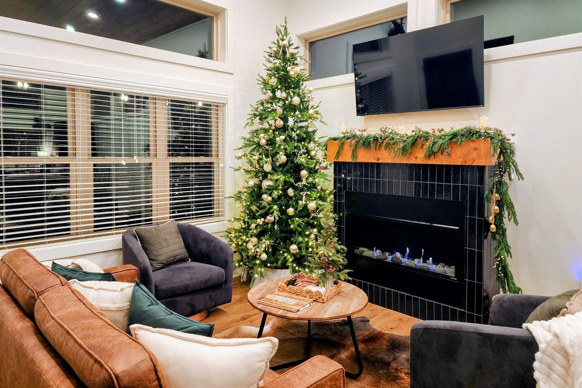 Cozy up and gather round the tree. 