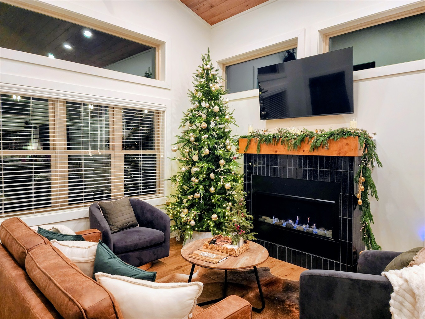 Cozy up and gather round the tree. 