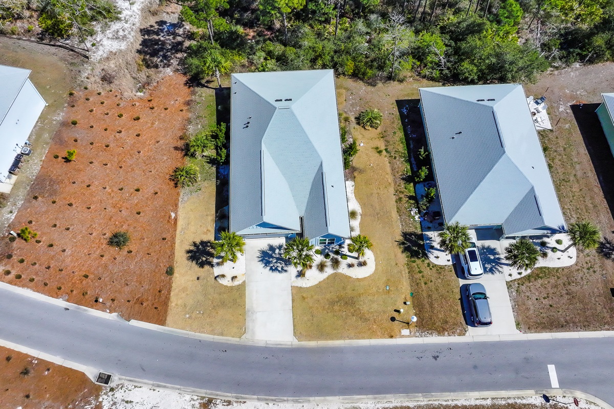 Only minutes away on foot or by golf cart from the town center, pool, playground, and beach.