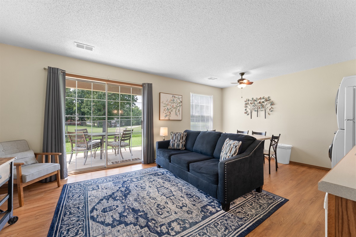 Bright, open living area with direct patio access for indoor-outdoor relaxation.