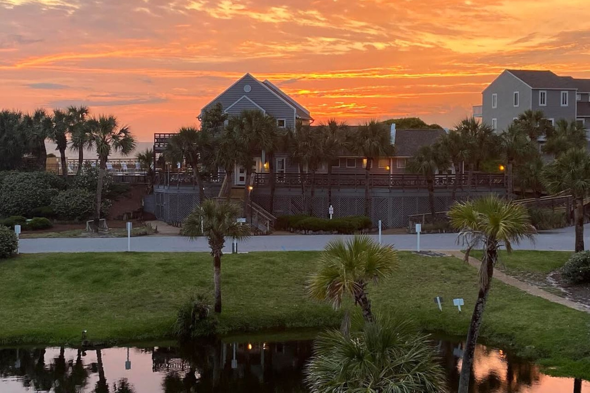 Watch the sky turn gold and amber from your private deck &mdash; this sunset happens every single night, and it is all yours.