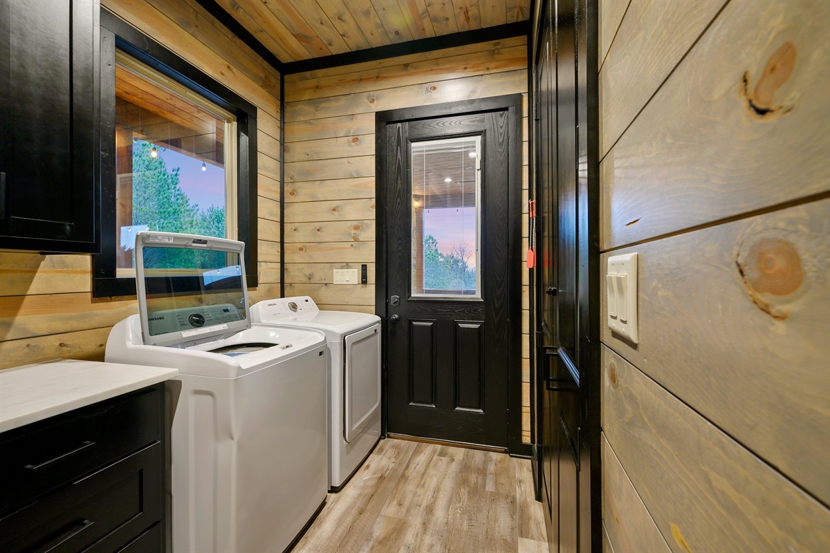 Full size washer and dryer in the laundry room located off the kitchen.