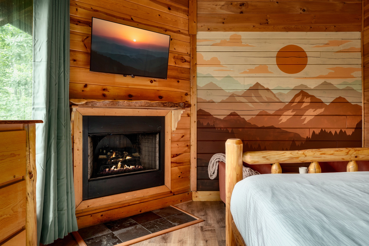 Themed bedrooms with murals- Bluff mountain sunrise room!