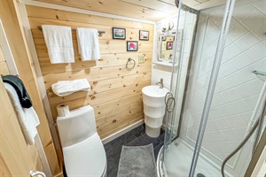 Is small but equipped! Brand new stand up shower, toilet and vanity