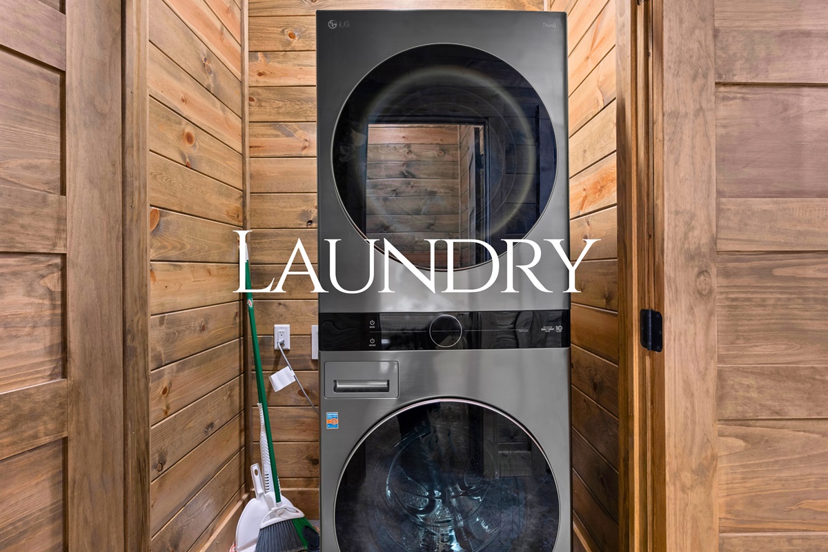 Laundry area with washer and dryer for guest use.
