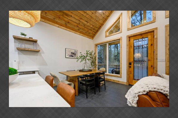 Vaulted ceilings and seamless indoor-outdoor charm