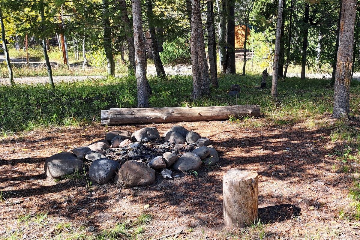 Fire pit area inside horseshoe driveway