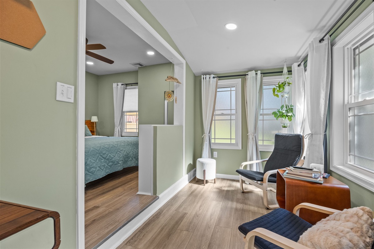 Unwind in the master bedroom lounge. Perfect for reading, sipping coffee, or just relaxing