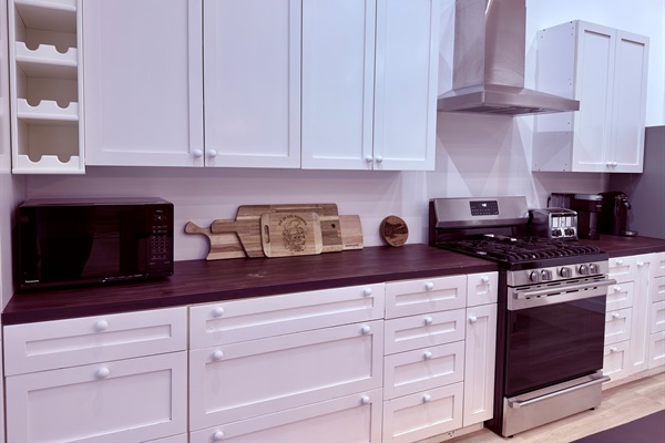 Kitchen counter space with coffee maker and cooking essentials