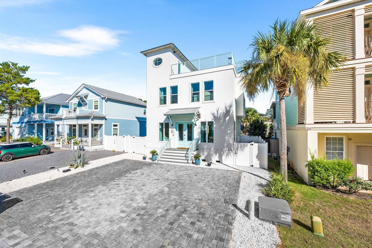 Forget the car—you’re just 10 minutes from the beach. Our oversized driveway easily fits 5 cars for your group of 12. Perfect too if you have a big truck or two!