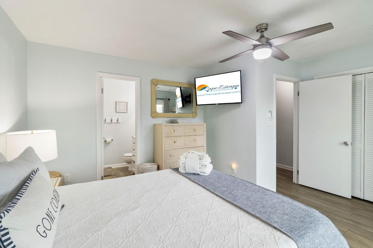 Settle into Queen Suite One &mdash; your own private deck, ensuite bath, Smart TV, and Gulf glimpses.