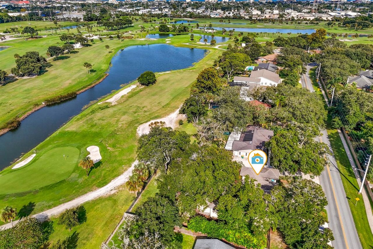 Arial view of the home next to the golf course