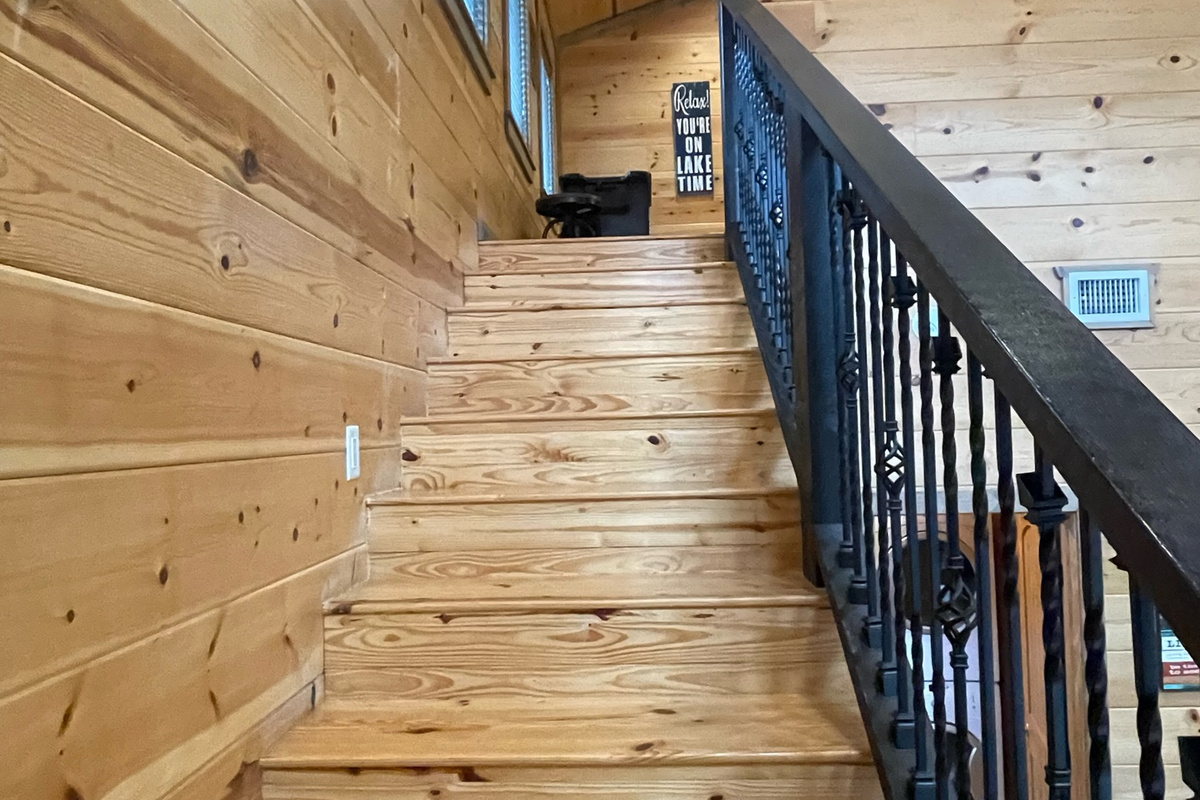 Head upstairs to the 2nd Master bedroom and game/bunk room.