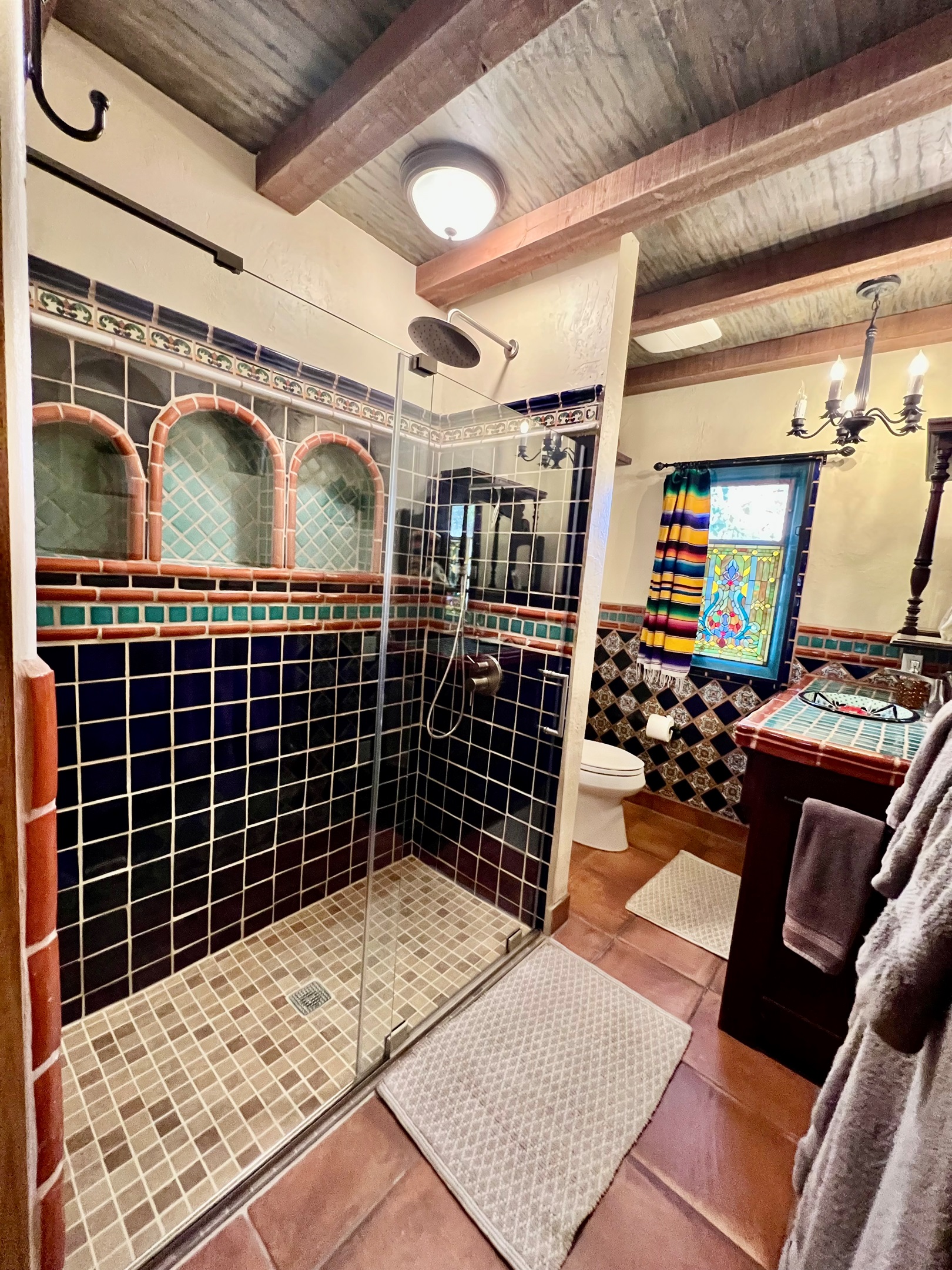 Immerse yourself in the vibrant colors and patterns of this Mexican-inspired bathroom.