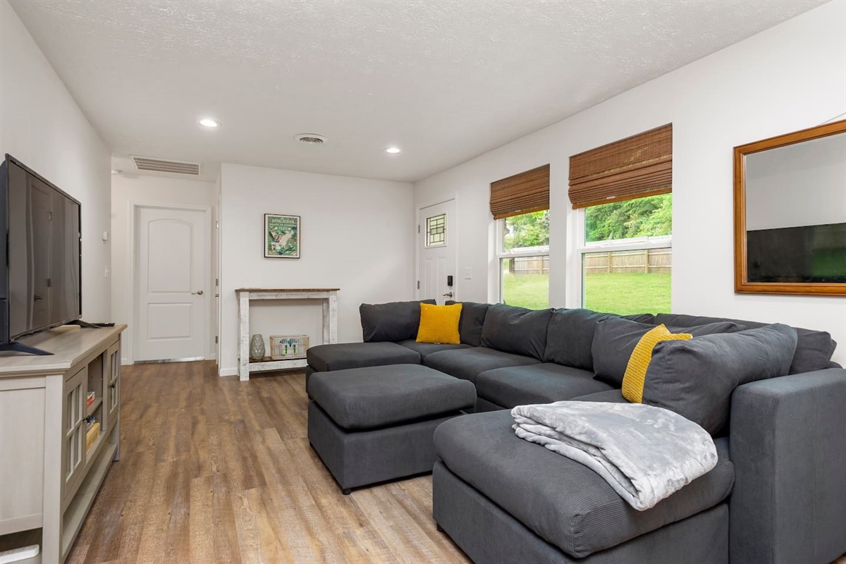 Come in and make yourself at home in our living room where everyone in your group can spend time together making memories at our French Broad River home.