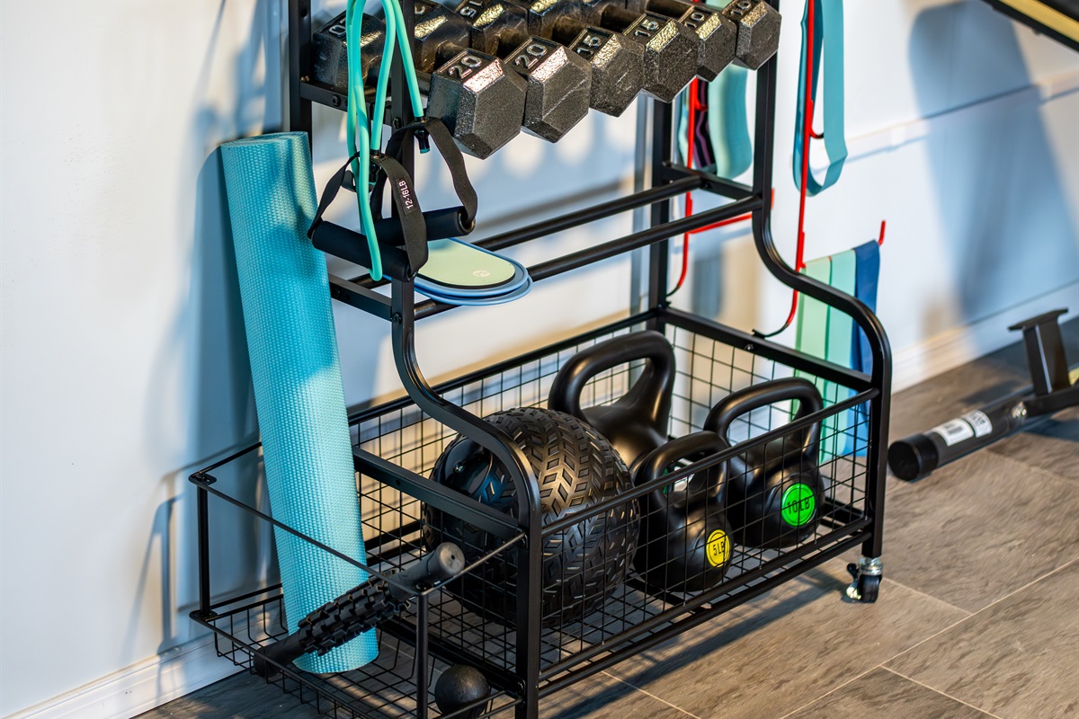 Fitness-friendly amenities including dumbbells, kettlebells, and workout gear for strength training anytime.