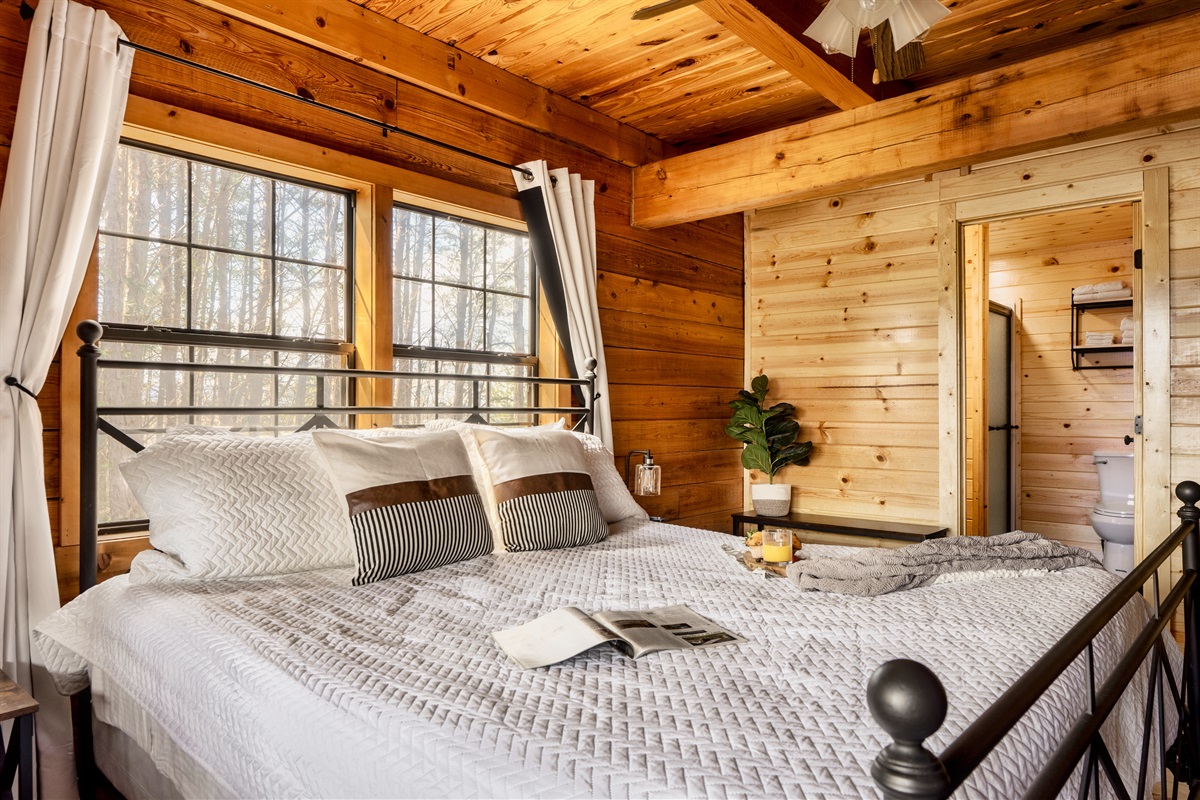 The combination of a welcoming bed and a beautiful window makes it a perfect haven for relaxation!