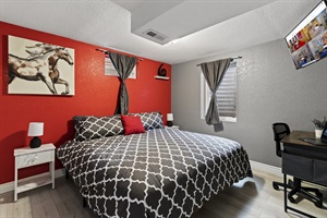 Luxurious King Bedroom with Entertainment