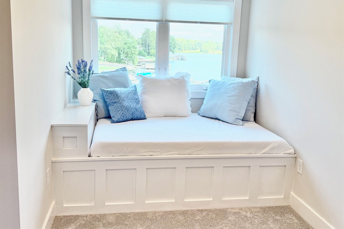 This full-size bed is such a unique option for this bedroom! It also adds such a romantic touch to this room. It offers such flexibility for parents who need a sleeping option for their kids that might need to sleep in their bedroom.