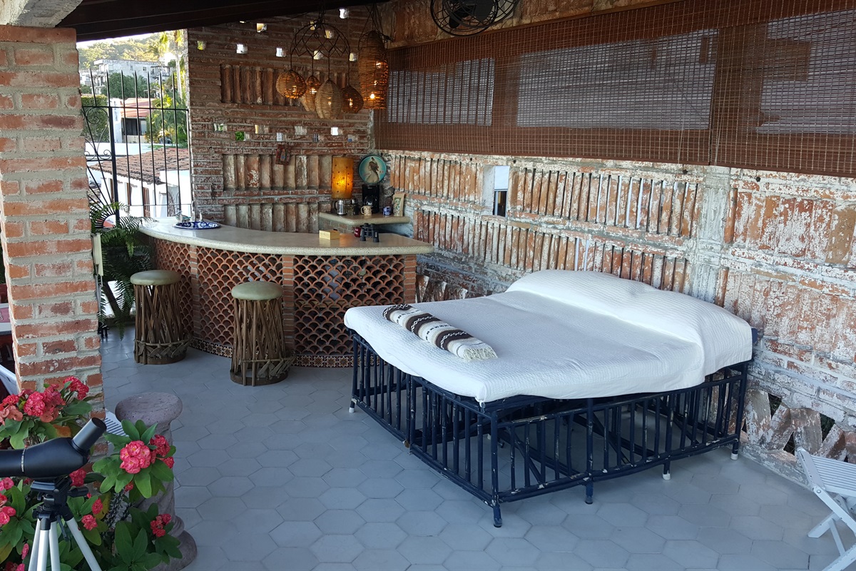 The private terrace is the perfect space to drink coffee and watch for whales or have a cocktail after dinner and watch the fireworks go off every night on the bay.