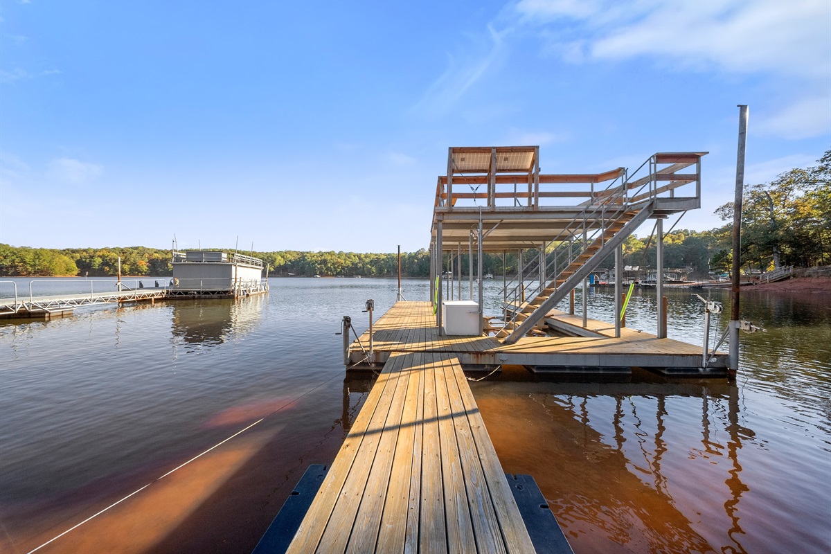 Two-level dock with access for boats, fishing, and floating.