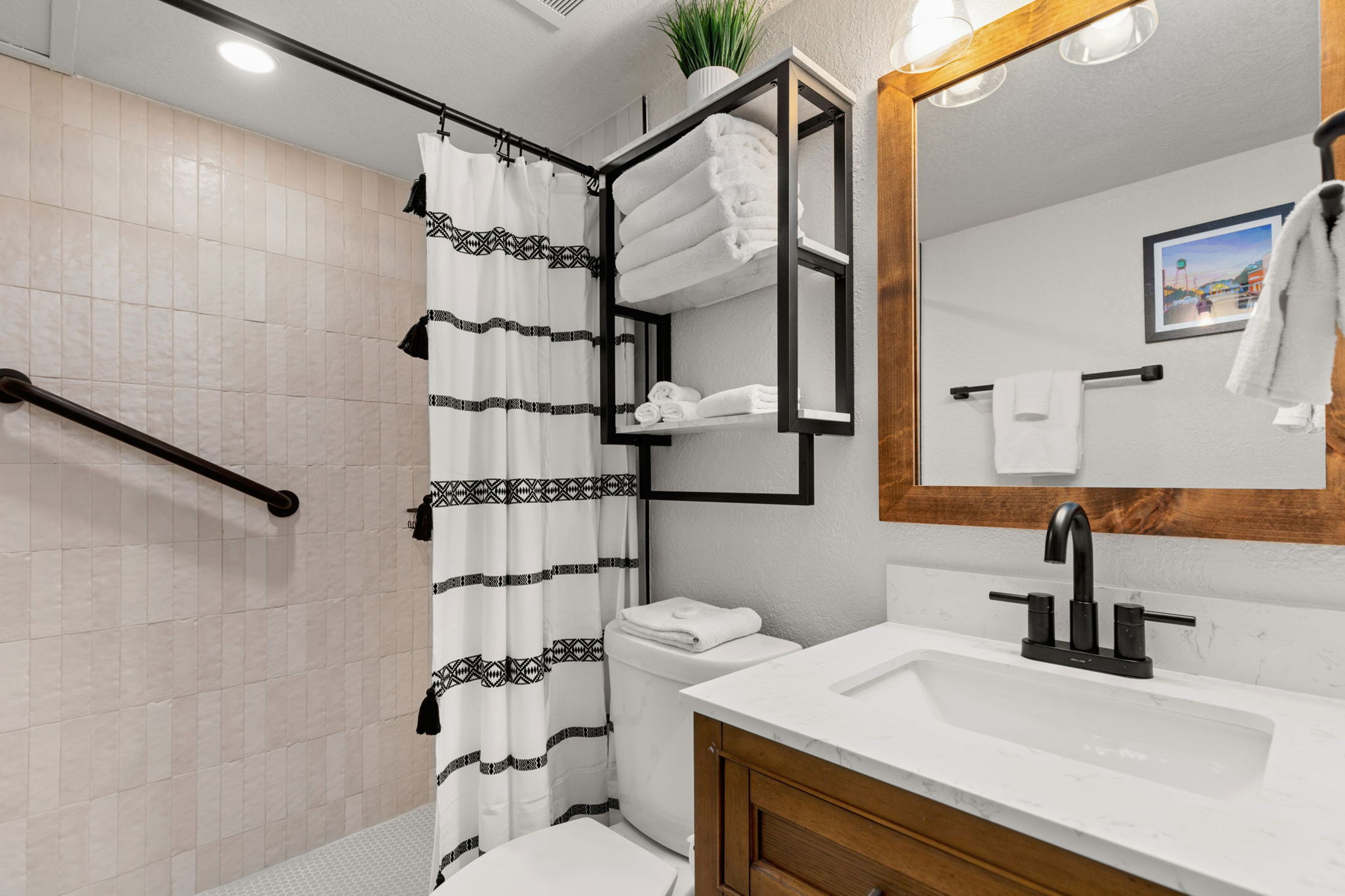 Guest bathroom with grab bar.