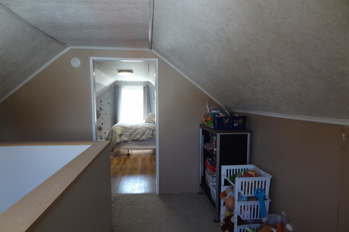 3rd bedroom upstairs with queen bed