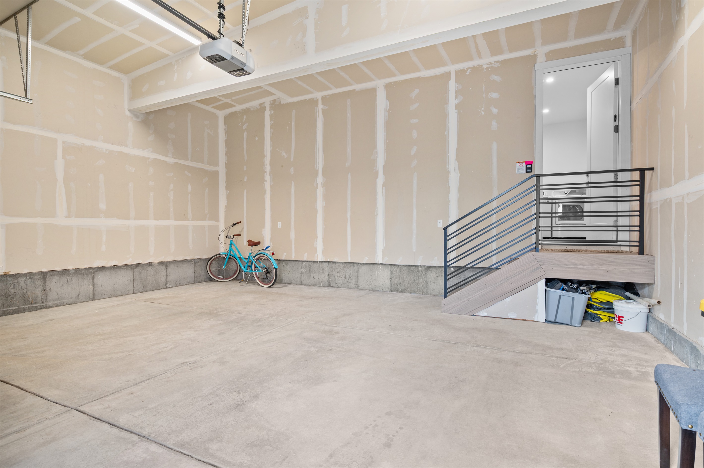 Enter through the garage.