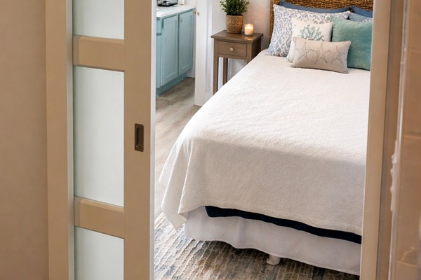Step through your private en suite entry into a calm, coastal-inspired space designed for easy, comfortable stays.
