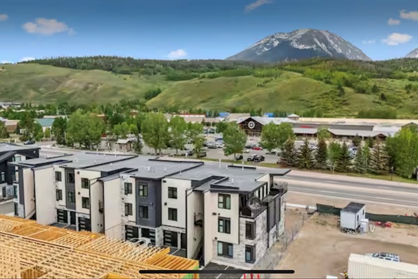 View from the entry ( back, east side).  Patio and living room views are on the west, facing the gore range.  Please note new construction behind and to the east 