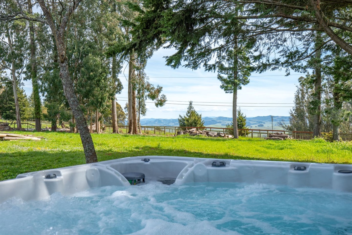 Dip into enchantment: Hot tub with awe-inspiring panoramic views.