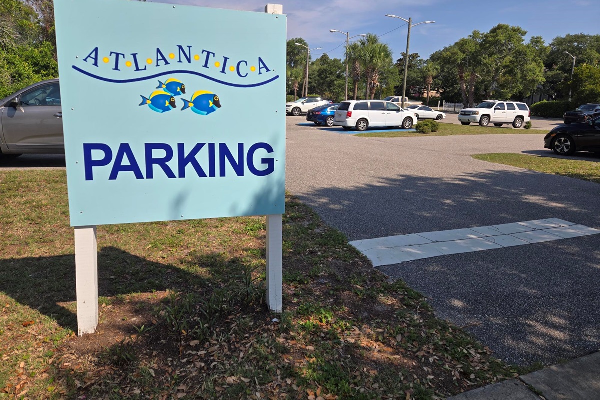 Only park in the labeled, designated parking lots for the Atlantica Resort - look for this sign