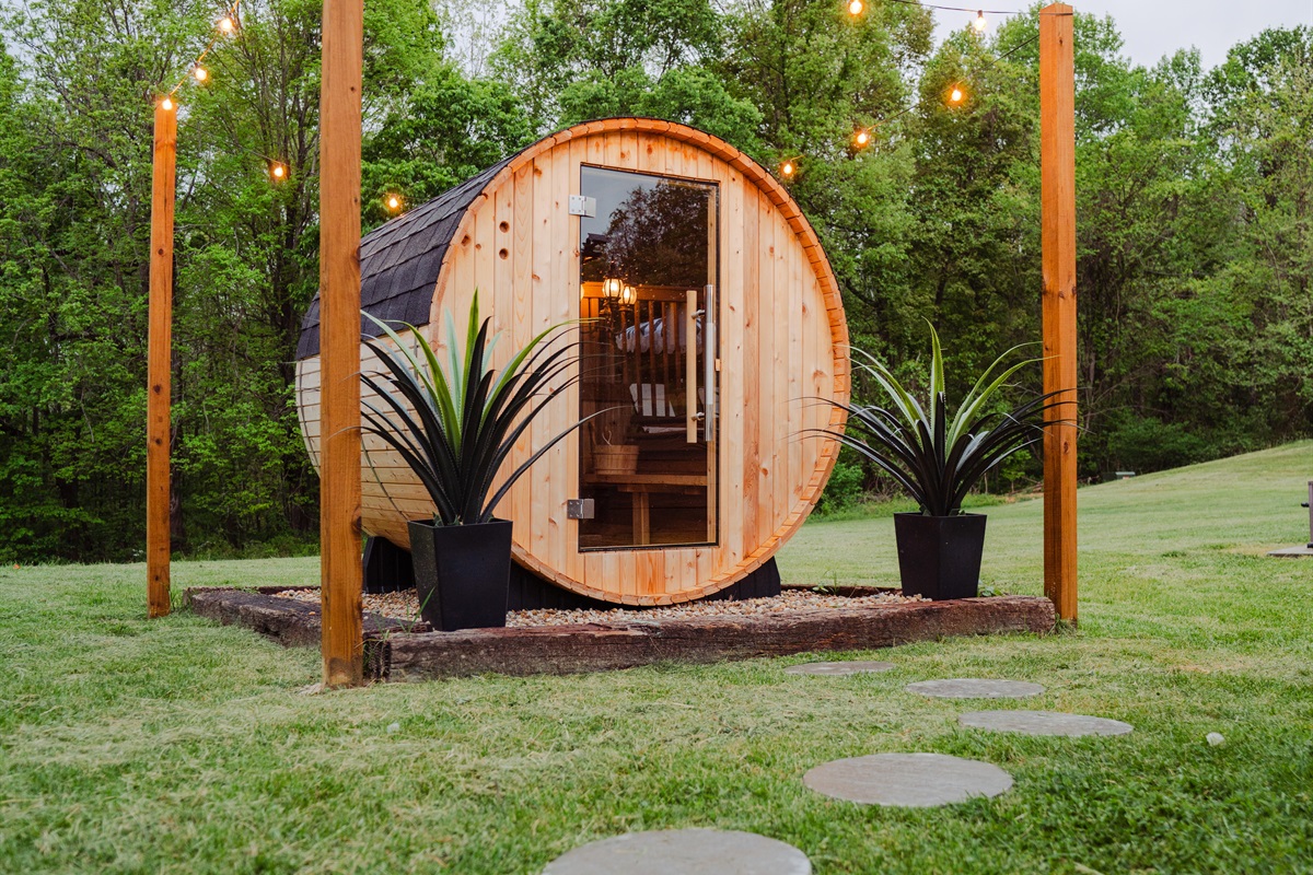 A soothing sauna retreat surrounded by lush trees and quiet nature