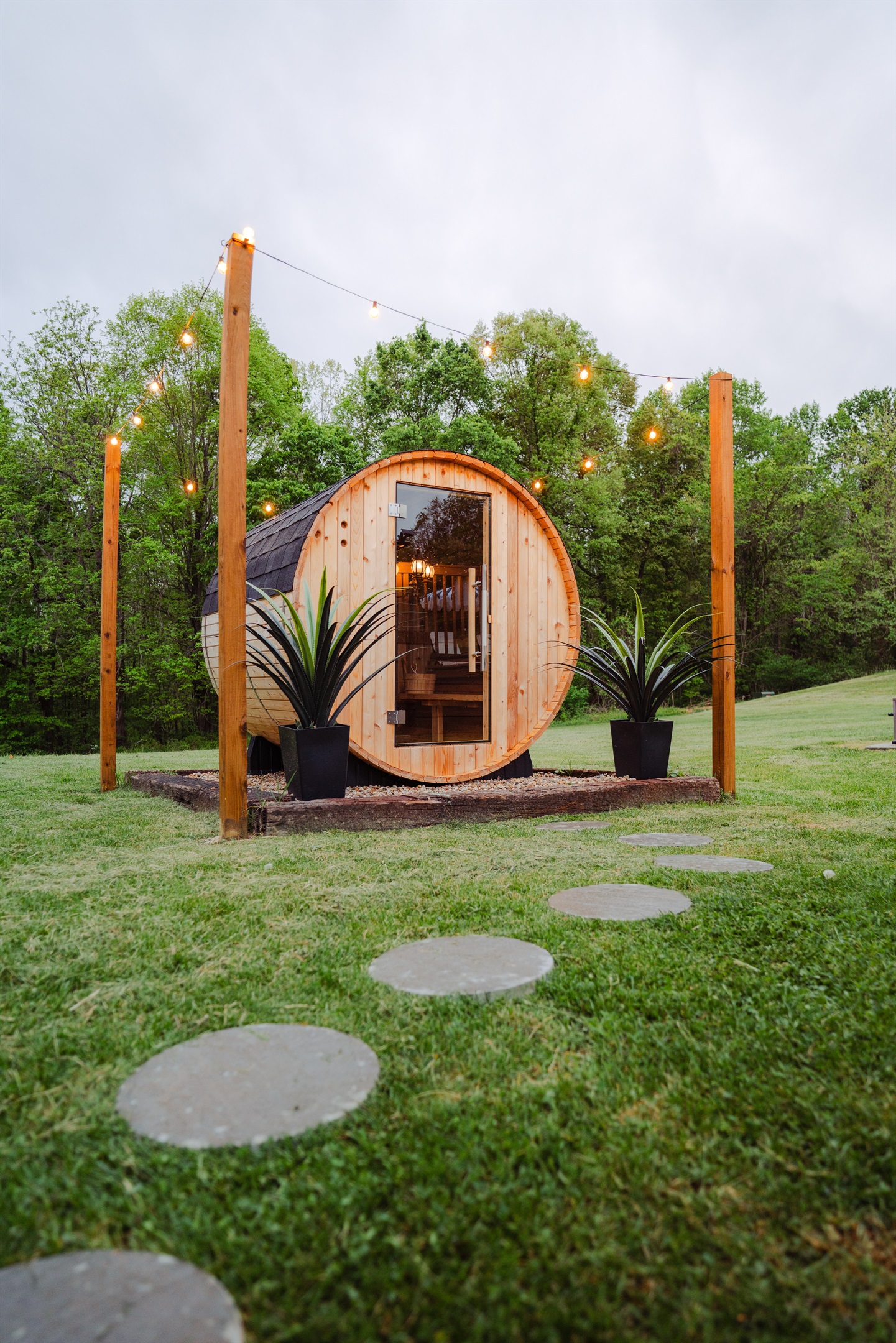 A soothing sauna retreat surrounded by lush trees and quiet nature