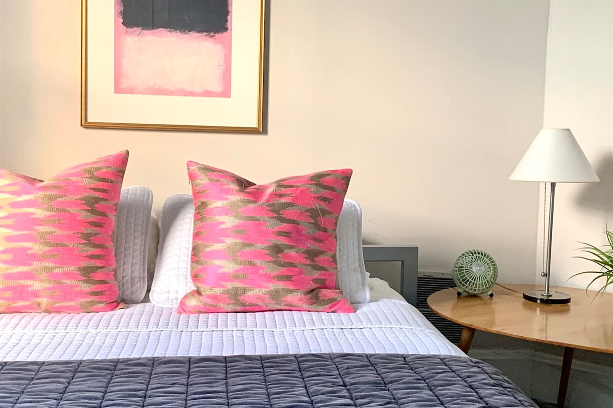 Queen Bedroom featuring soft cotton linesn, layered textures, ambient lighting, and thoughtfully curated decor - designed for comfort and longer stays