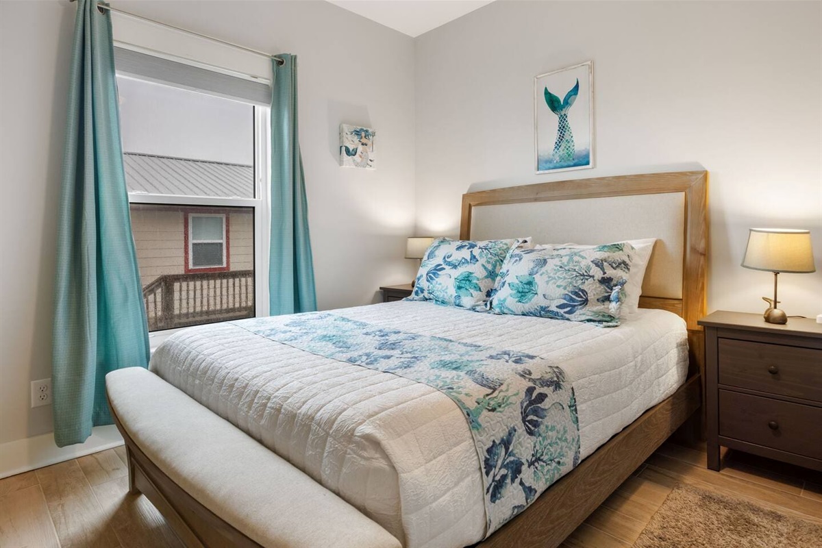 Queen bed in right side Guest bedroom 